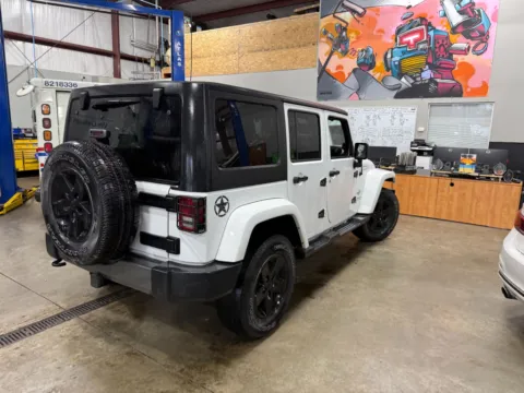 Another view of 2014 Jeep Wrangler Unlimited Freedom Edition for sale in Indianapolis, IN at Indy Auto Man - Indianapolis