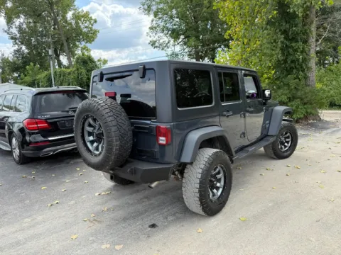 More photos of 2017 Jeep Wrangler Unlimited Sport at Indy Auto Man, IN