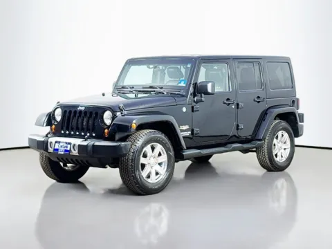 Another view of 2013 Jeep Wrangler Unlimited Sahara for sale in Morristown, NJ at CarLink Morristown
