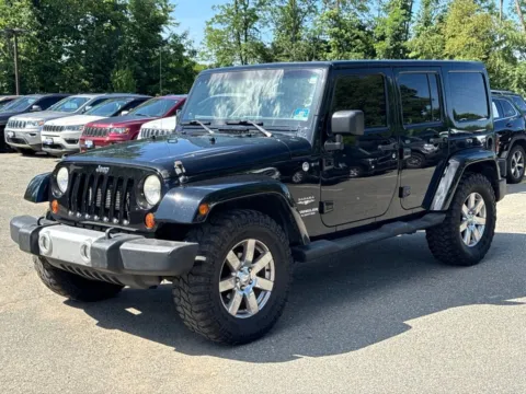 Another view of 2013 Jeep Wrangler Unlimited Sahara for sale in Morristown, NJ at CarLink Morristown