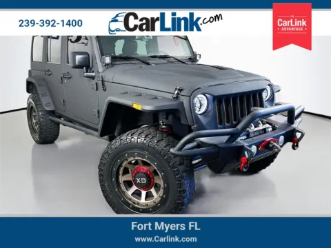 Black 2015 Jeep Wrangler Unlimited Sport for sale in Fort Myers, FL
