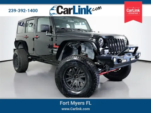 Black 2015 Jeep Wrangler Unlimited Sport for sale in Fort Myers, FL