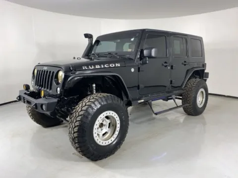 Another view of 2014 Jeep Wrangler Unlimited Rubicon for sale in Blue Springs, MO at MAG Auto - Munsterman Automotive Group