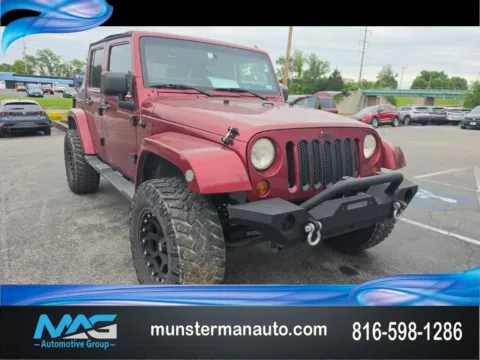 Red 2012 Jeep Wrangler Unlimited Sahara for sale in Blue Springs, MO