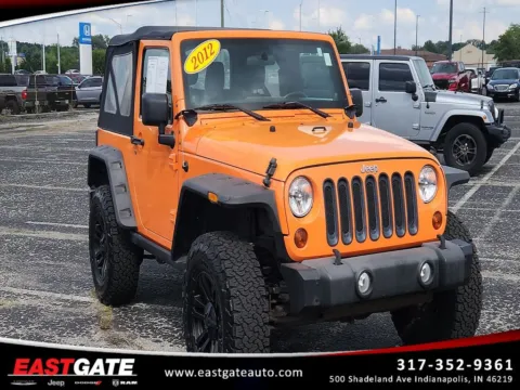 Orange 2012 Jeep Wrangler Sport for sale in Indianapolis, IN