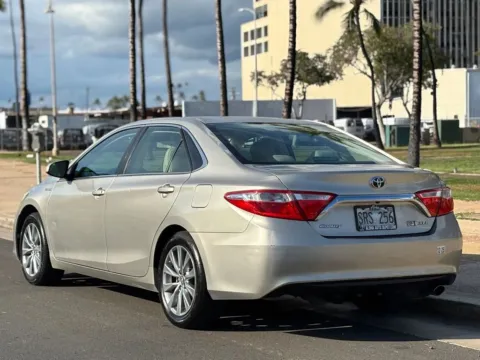 Another view of 2015 Toyota Camry Hybrid XLE for sale in Honolulu, HI at Aloha Auto Depot LLC.