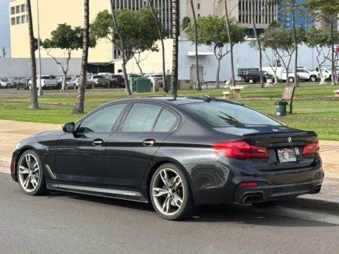 Another view of 2018 BMW 5 Series M550i xDrive for sale in Honolulu, HI at Aloha Auto Depot LLC.