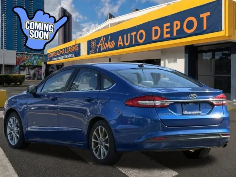 Another view of 2017 Ford Fusion Hybrid S for sale in Honolulu, HI at Aloha Auto Depot LLC.