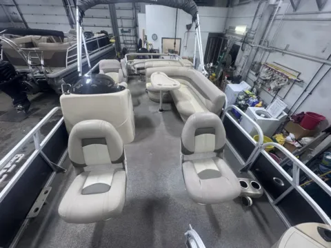 Gray 2015 SUNTRACKER FISHIN BARGE 22 DLX 90HP BUNK TRAILER FISHIN BARGE 22 DLX 90HP for sale in Fargo, ND