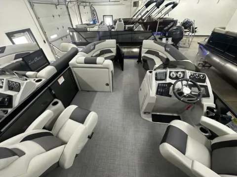 More photos of 2026 SUNCHASER GENEVA SPORT 23 LR DH TRIPLE 150HP BUNK TRAILER at McLaughlin's RV and Marine, ND