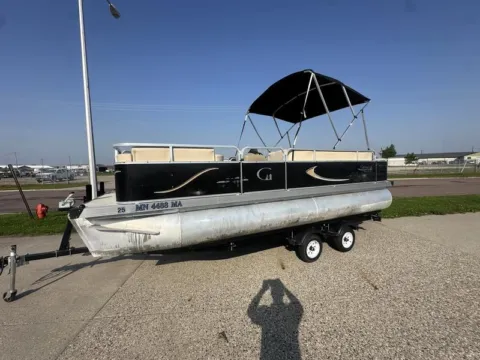 Photos of 2019 GRAND ISLAND 19 CRUISE 25HP BUNK TRAILER for sale in Fargo, ND at McLaughlin's RV and Marine - Fargo