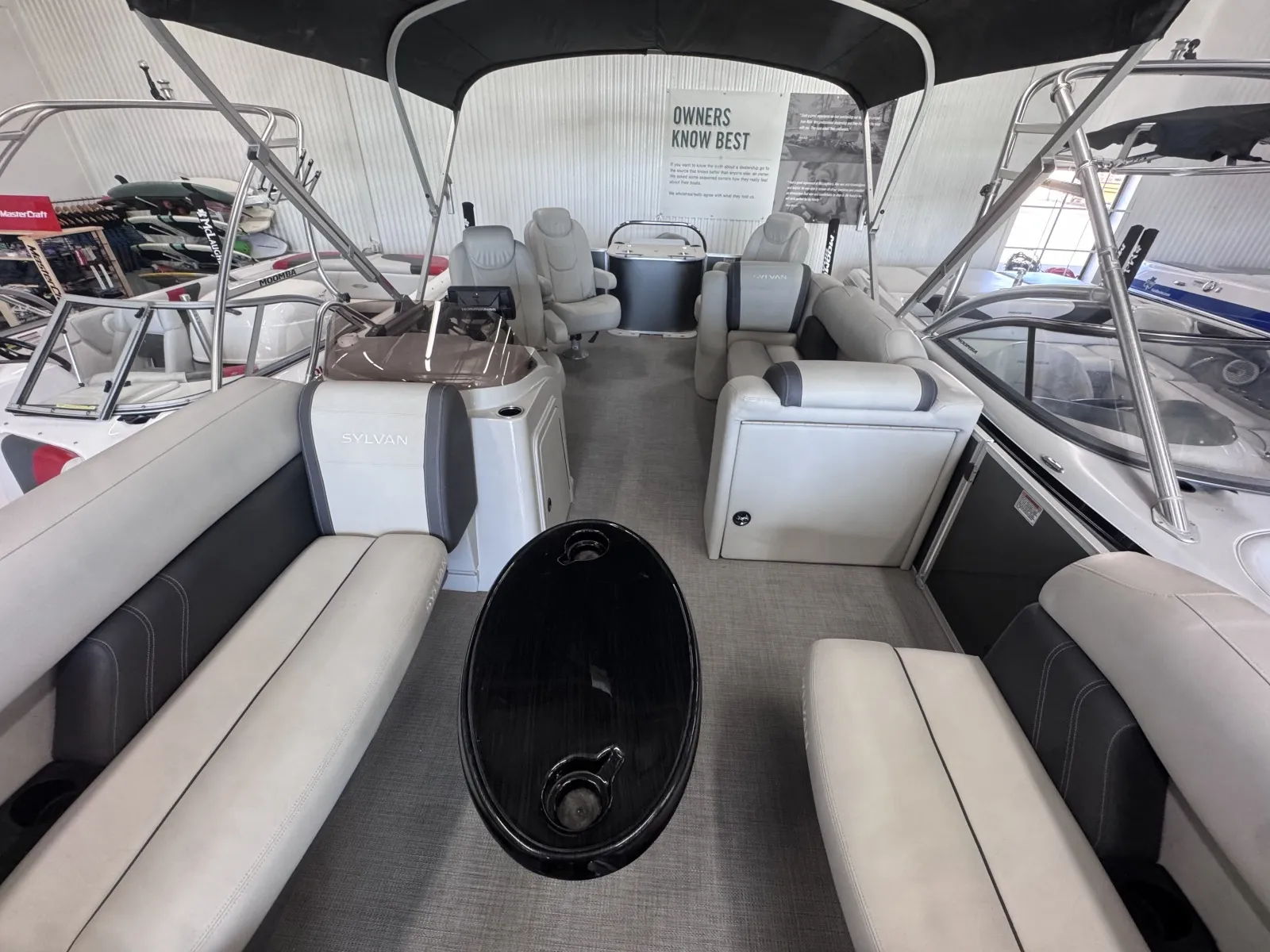 Gray 2022 SYLVAN MIRAGE 8522 PARTY FISH 115HP VMAX BUNK TRAILER for sale in Fargo, ND