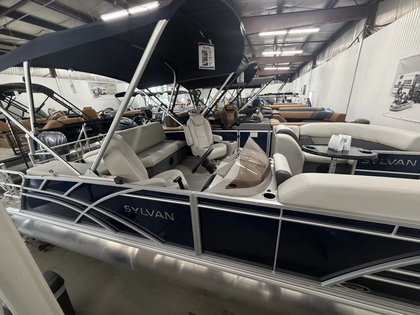 Photos of 2026 SYLVAN MIRAGE 8522 CLZ DH 150HP BUNK TRAILER for sale in Fargo, ND at McLaughlin's RV and Marine - Fargo