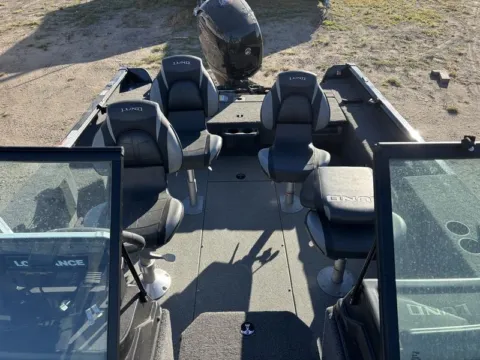 Photos of 2025 LUND 1875 IMPACT XS 150HP for sale in Fargo, ND at McLaughlin's RV and Marine