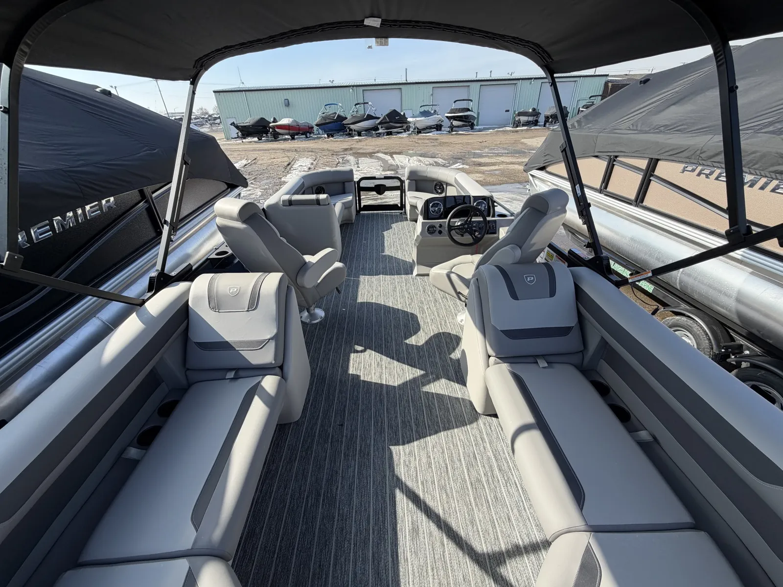 Photos of 2026 PREMIER SUNSCAPE 220 RF PTX TRIPLE 200HP BUNK TRAILER for sale in Fargo, ND at McLaughlin's RV and Marine - Fargo