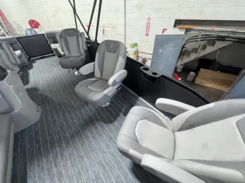 Photos of 2026 PREMIER SUNSCAPE 200 RF 90HP BUNK TRAILER for sale in Fargo, ND at McLaughlin's RV and Marine - Fargo