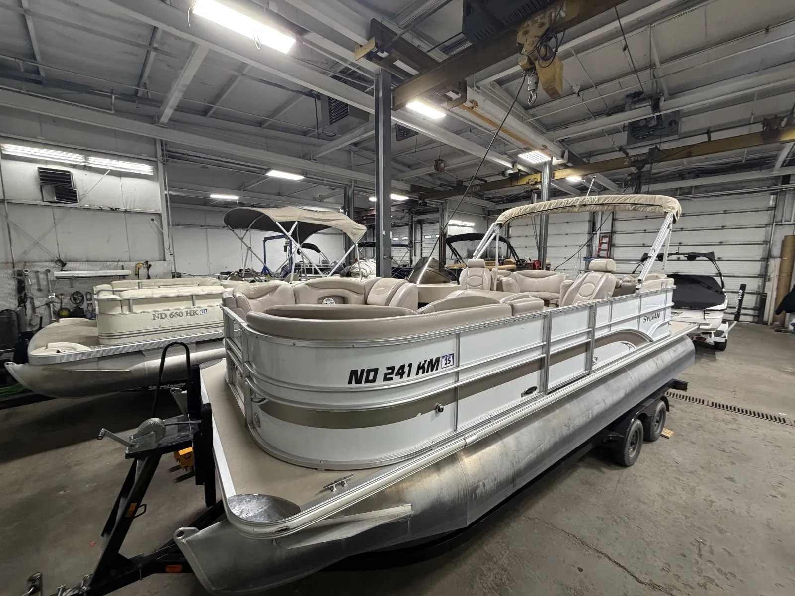 Photos of 2014 SYLVAN MIRAGE 8522 LZ 115HP BUNK TRAILER for sale in Fargo, ND at McLaughlin's RV and Marine - Fargo