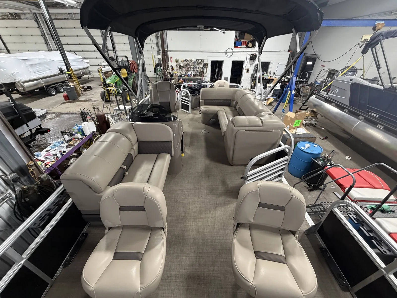 Photos of 2021 SUNTRACKER FISHIN BARGE 20 DLX 90HP BUNK TRAILER for sale in Fargo, ND at McLaughlin's RV and Marine - Fargo