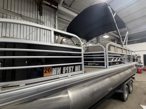 Photos of 2021 SUNTRACKER FISHIN BARGE 20 DLX 90HP BUNK TRAILER for sale in Fargo, ND at McLaughlin's RV and Marine - Fargo