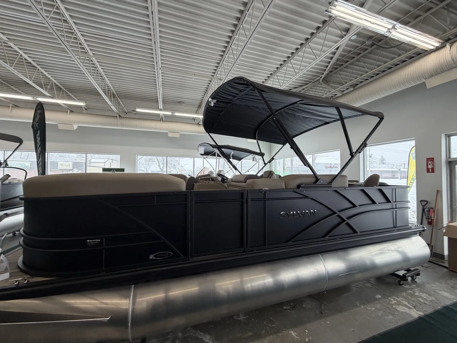 Photos of 2026 SYLVAN MIRAGE 820 PARTY FISH 90HP BUNK TRAILER for sale in Fargo, ND at McLaughlin's RV and Marine - Fargo