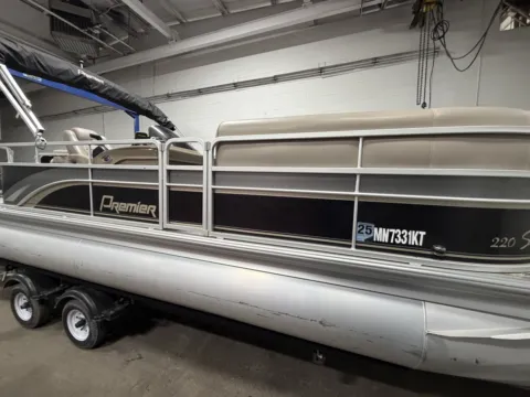 Photos of 2011 PREMIER SUNSATION 225 90HP LEGS BUNK TRAILER for sale in Fargo, ND at McLaughlin's RV and Marine - Fargo