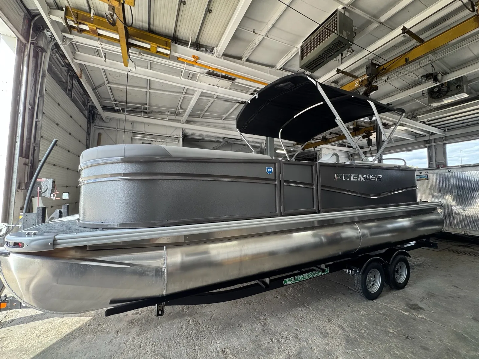 Photos of 2027 PREMIER SUNSCAPE 220 RF 115HP BUNK TRAILER for sale in Fargo, ND at McLaughlin's RV and Marine - Fargo