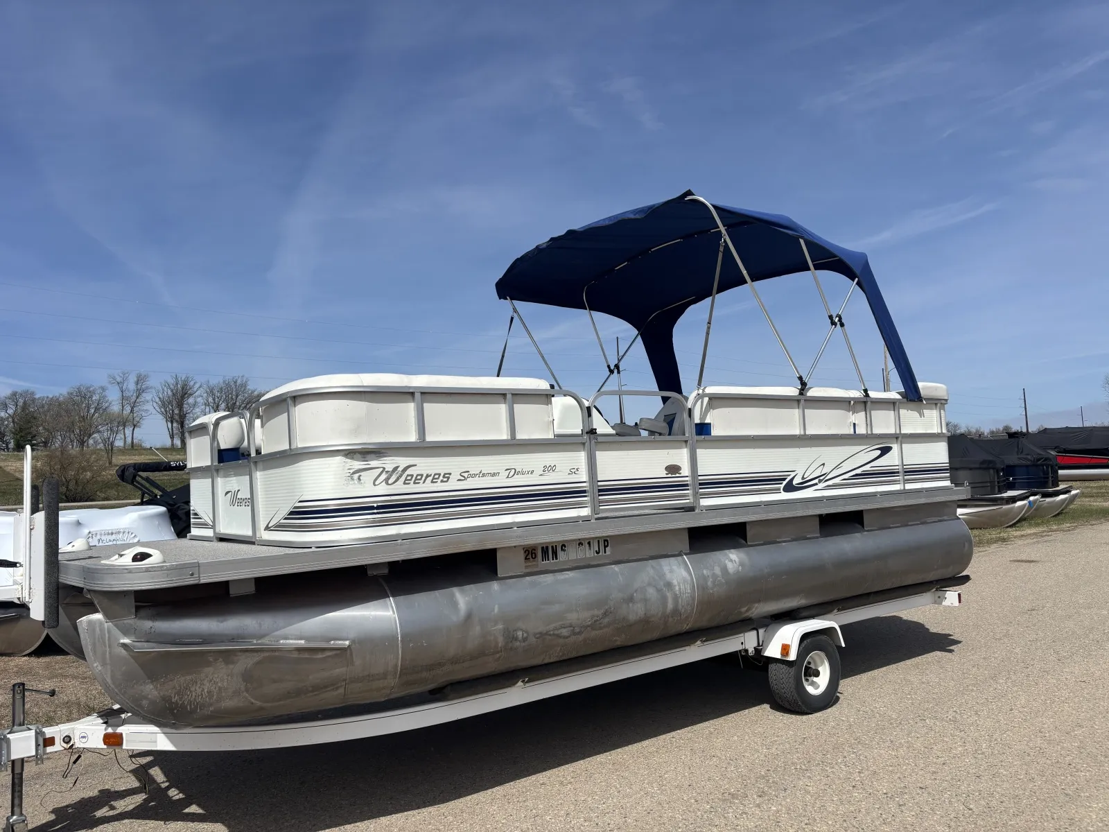 Another view of 2003 WEERES SPORTSMAN DELUXE 200-23 60HP BUNK TRAILER for sale in Detroit Lakes, MN at McLaughlin's RV & Marine - Detroit Lakes