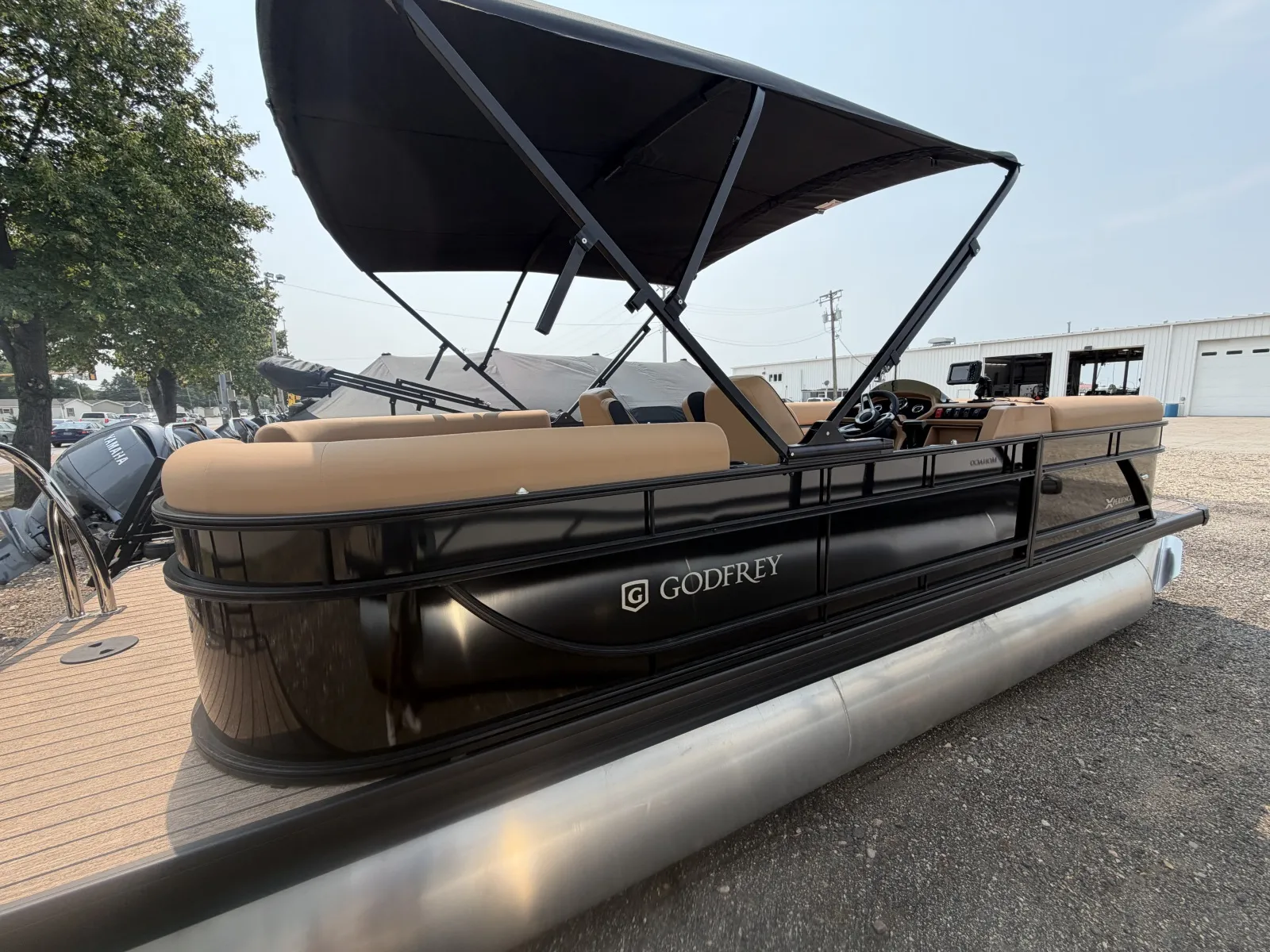 Photos of 2027 GODFREY XPERIENCE 2286 SBX 150HP BUNK TRAILER for sale in Fargo, ND at McLaughlin's RV and Marine - Fargo