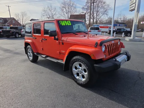 Orange 2015 Jeep Wrangler Unlimited Sahara for sale in Hamburg, PA