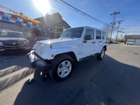 Photos of 2012 JEEP WRANGLER UNLIMI SAHARA for sale in Scottsburg, IN at Jeffrey's Auto Exchange, Inc.