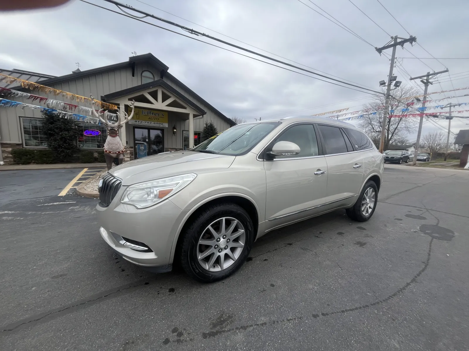Gold 2015 BUICK ENCLAVE LEATHER for sale in Scottsburg, IN