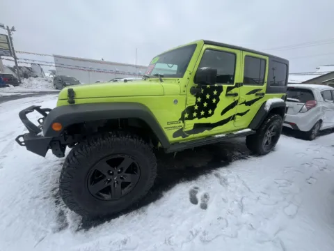 Green 2017 JEEP WRANGLER UNLIMI SPORT S for sale in Scottsburg, IN