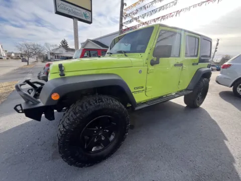Green 2017 JEEP WRANGLER UNLIMI SPORT S for sale in Scottsburg, IN