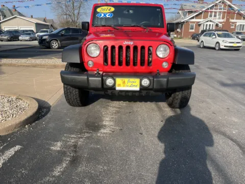 Photos of 2014 JEEP WRANGLER UNLIMI SPORT for sale in Scottsburg, IN at Jeffrey's Auto Exchange, Inc.