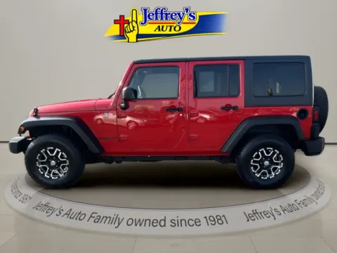 Photos of 2014 JEEP WRANGLER UNLIMI SPORT for sale in Scottsburg, IN at Jeffrey's Auto Exchange, Inc.