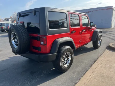 More photos of 2014 JEEP WRANGLER UNLIMI SPORT at Jeffrey's Auto Exchange, Inc., IN