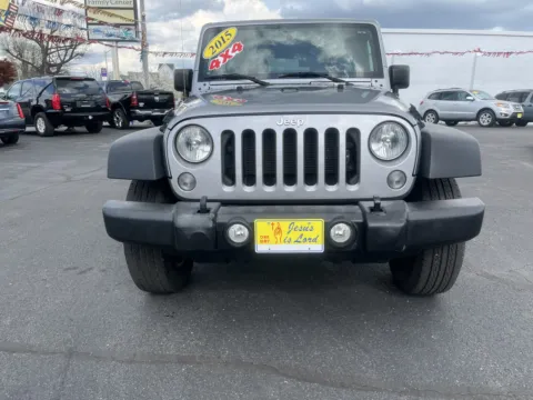 Photos of 2015 JEEP WRANGLER UNLIMI SPORT for sale in Scottsburg, IN at Jeffrey's Auto Exchange, Inc.