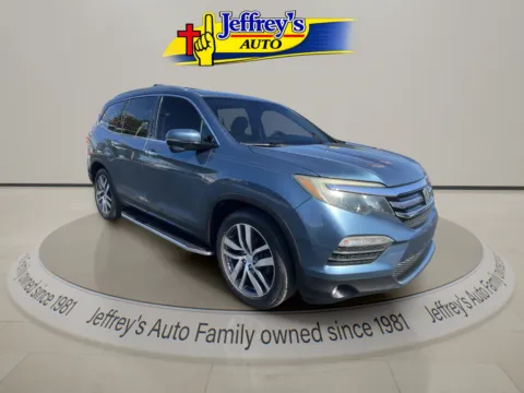 Another view of 2017 HONDA PILOT TOURING for sale in Scottsburg, IN at Jeffrey's Auto Exchange, Inc.