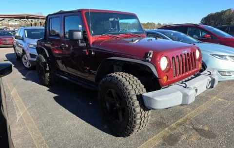 Red 2010 Jeep Wrangler Unlimited Rubicon for sale in Madison, NC