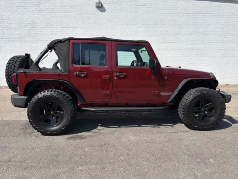 Red 2010 Jeep Wrangler Unlimited Rubicon for sale in Madison, NC