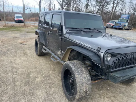 Gray 2014 Jeep Wrangler Unlimited Rubicon for sale in Madison, NC