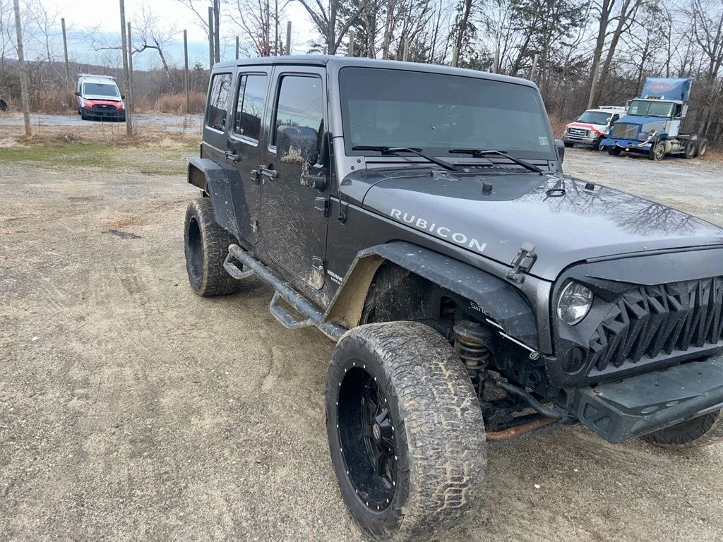 Gray 2014 Jeep Wrangler Unlimited Rubicon for sale in Madison, NC