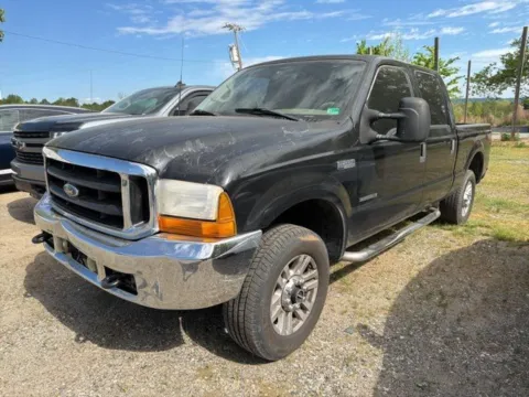 Orange 2001 Ford F-250SD Lariat for sale in Madison, NC