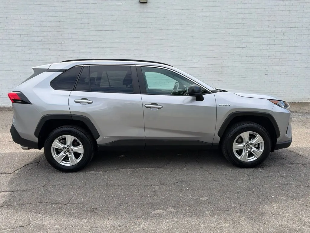 Silver 2021 Toyota RAV4 Hybrid LE for sale in Madison, NC