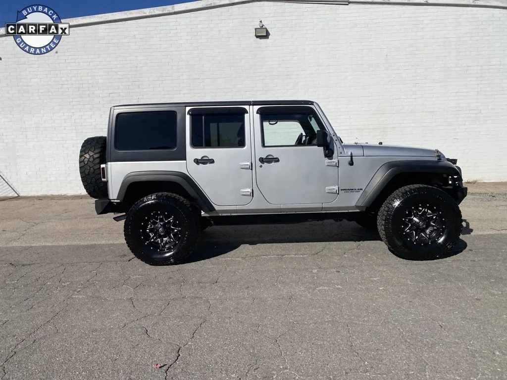 Silver 2011 Jeep Wrangler Unlimited Sahara for sale in Madison, NC