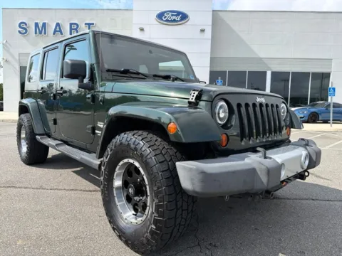 Green 2010 Jeep Wrangler Unlimited Sahara for sale in South Boston, VA