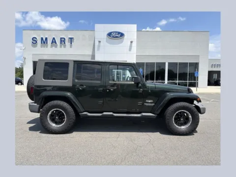 Green 2010 Jeep Wrangler Unlimited Sahara for sale in South Boston, VA