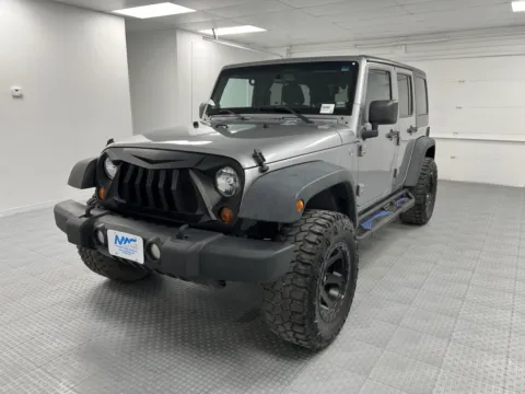 Another view of 2013 Jeep Wrangler Unlimited Sport for sale in Chillicothe, MO at MAG CDJR