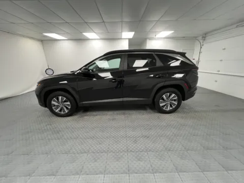 More photos of 2023 Hyundai Tucson Hybrid Blue at MAG CDJR, MO