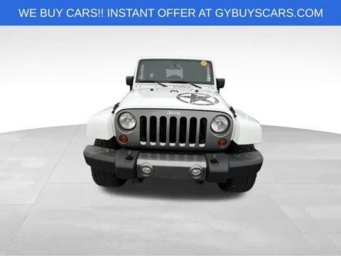 Another view of 2013 Jeep Wrangler Unlimited Freedom Edition for sale in Omaha, NE at Gregg Young Chevrolet of Omaha